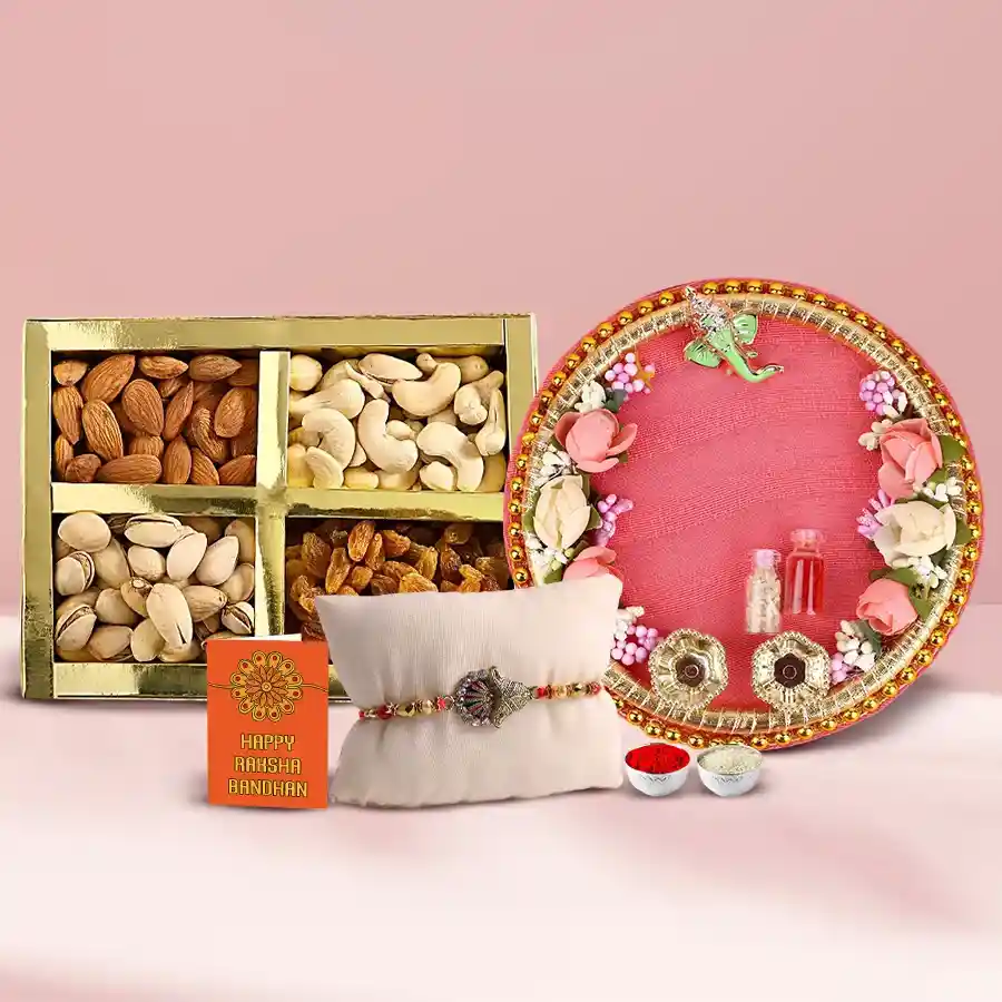 Auspicious Celebration Special Rakhi Pooja Thali with assorted dry fruits, a free Rakhi, Roli Tilak, and Chawal, beautifully gift-wrapped