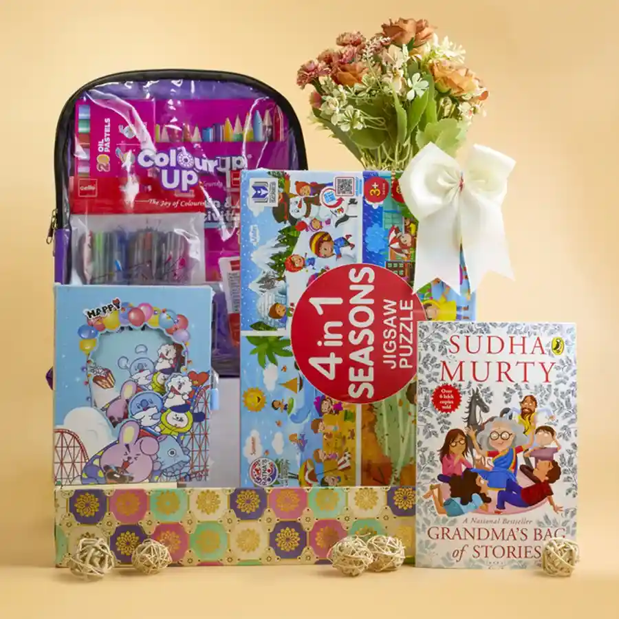 Children's Story and Playtime Gift Hamper featuring a colorful Cello ColourUp Hobby Bag, "Grandmas Bag of Stories" book by Sudha Murty, a 4-in-1 Indian Seasons Jigsaw Puzzle, a Kids Notebook, all in a stylish reusable Designer Basket.