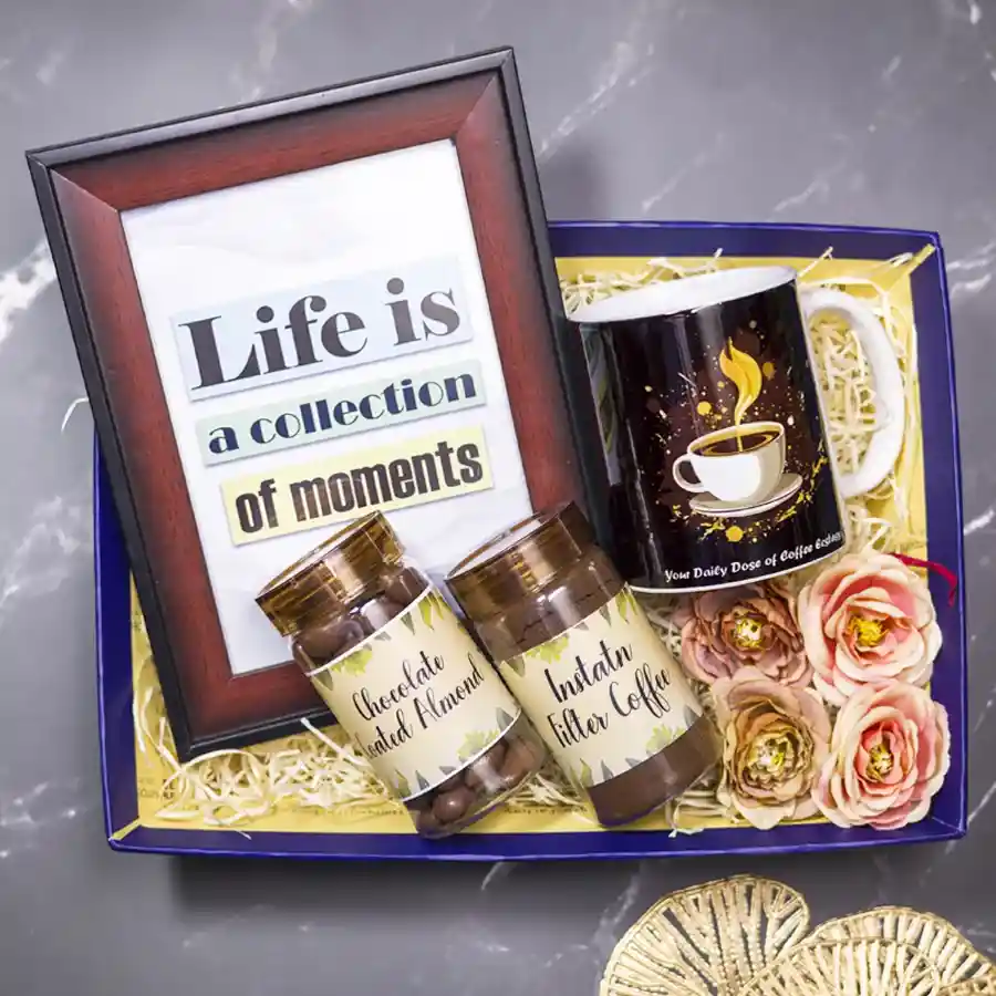Cherished Treats N Gifts Collection featuring a photo frame, chocolate-coated almonds, instant filter coffee, a trendy printed mug, and a reusable designer tray.