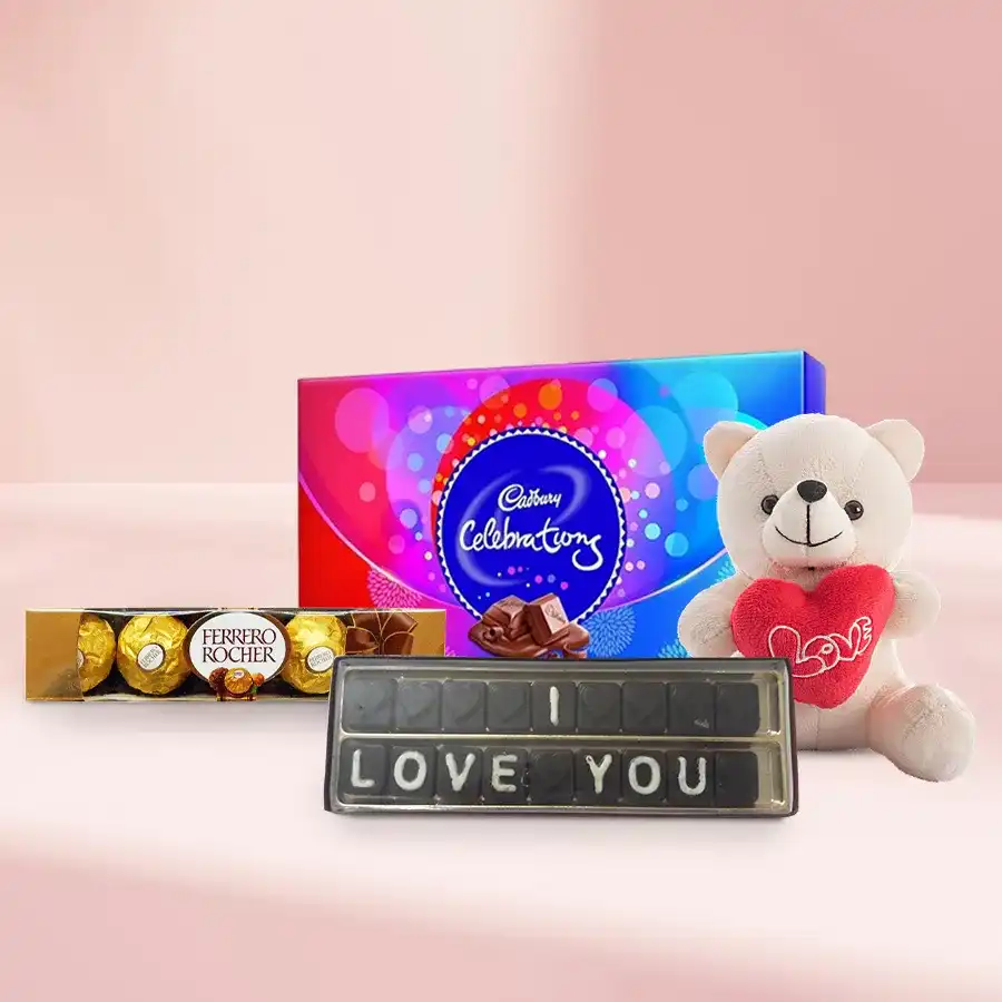 Awesome I Love You Gift Hamper featuring Ferrero Rocher chocolates, homemade treats, a Cadbury Celebration pack, and a 6-inch teddy bear arranged in a beautifully presented box.