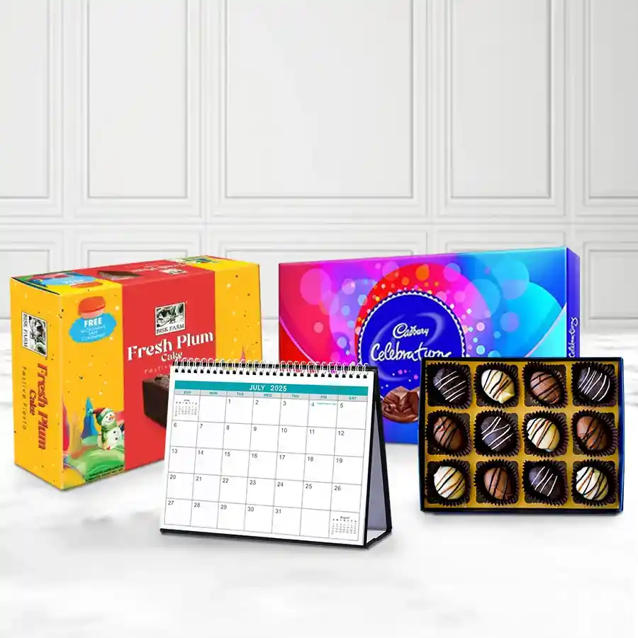 Graceful arrangement of New Year gift items including a desk calendar, Bisk Farm plum cake, Cadbury Celebration pack, and handmade chocolates