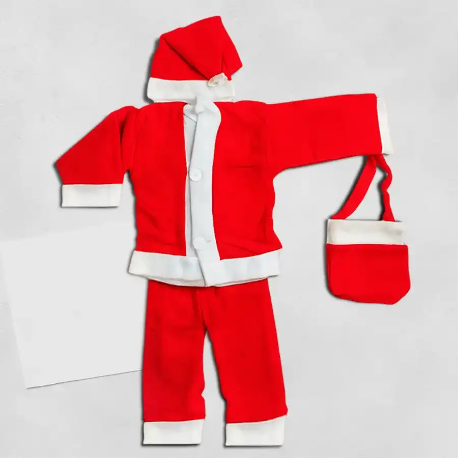 A joyful child wearing a cozy Santa Claus outfit, smiling in a festive setting decorated for Christmas.
