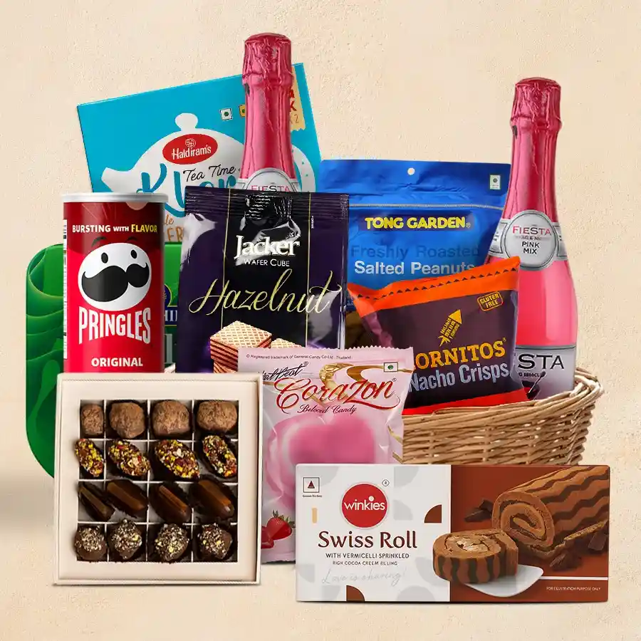 Opulent X-mas Hamper filled with festive treats including juice, chocolates, chips, and snacks arranged in a luxurious basket.