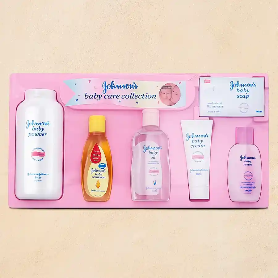 Attractive Gift Hamper for babies including Johnson Baby products like powder, lotion, oil, soap, cream, and shampoo.