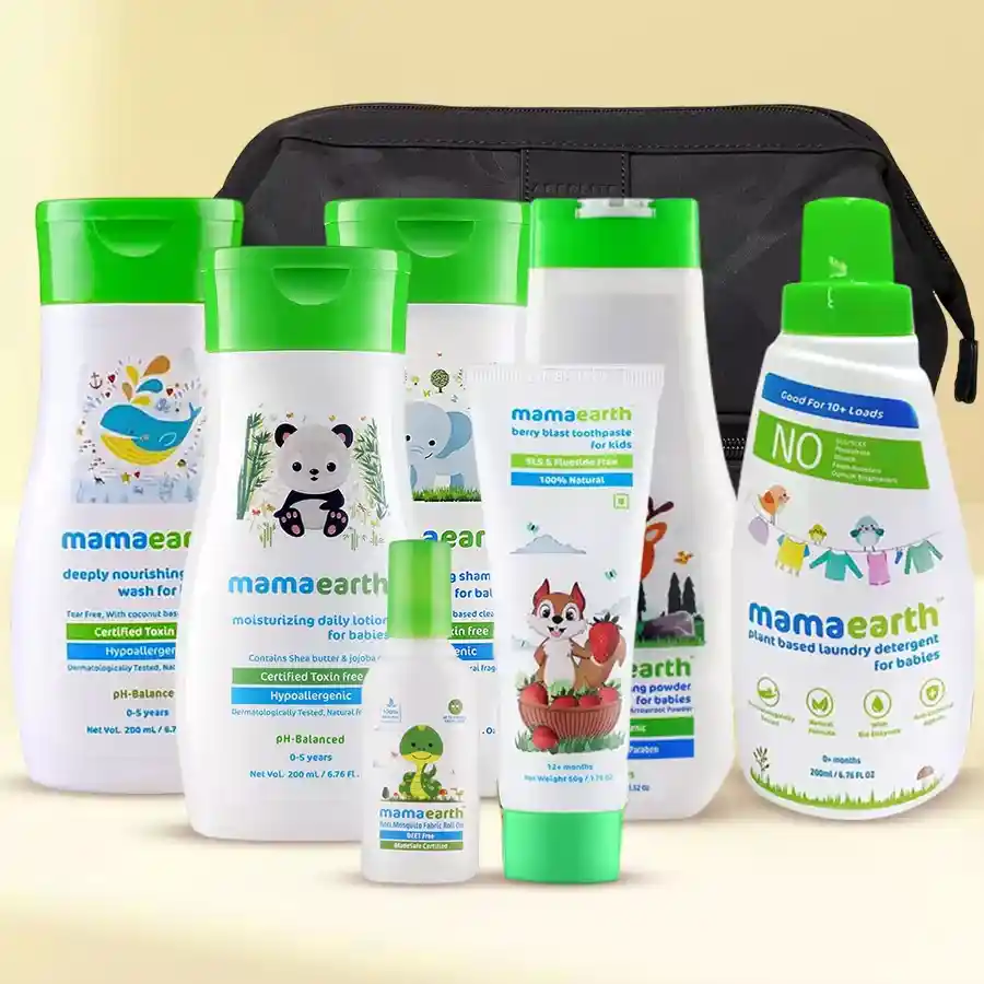 Stunning Mama Earths Kids Care Gift Hamper featuring body wash, shampoo, toothpaste, mosquito roll-on, laundry detergent, and toiletry bag on a colorful background.