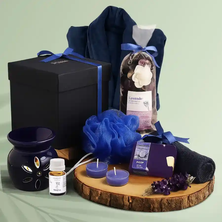 Ecstatic Lavender Soap Spa Set with a plush bathrobe, including lavender soaps, a soft face towel, an aromatic diffuser, lavender potpourri, a bath puff, and tea lights arranged elegantly for a serene spa experience.
