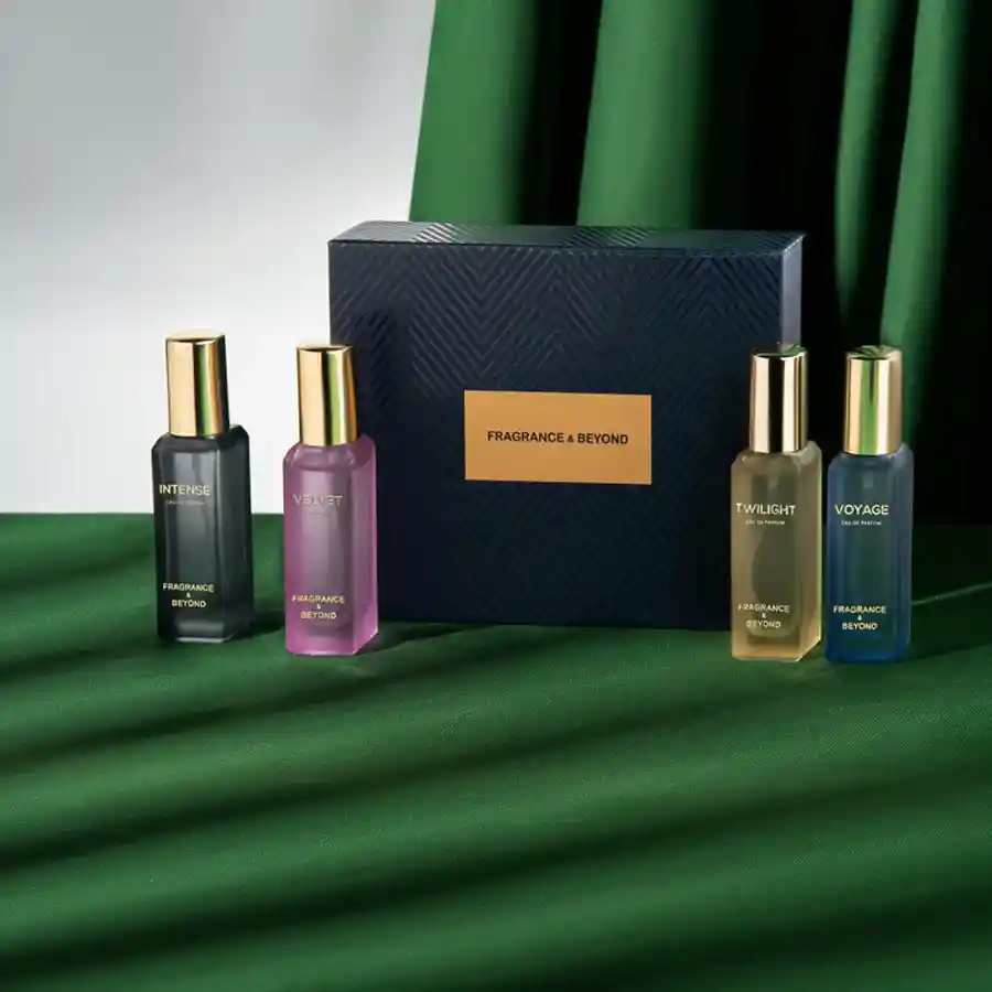 Aromatic 4-piece perfume gift set featuring Velvet, Twilight, Voyage, and Intense in elegant 20ml bottles, beautifully packaged