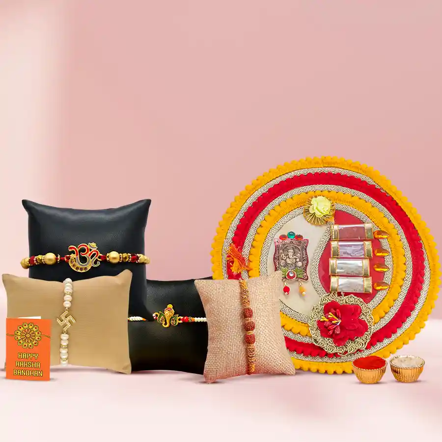 Traditional Rakhi Set of 4 displayed with Om, Swastik, Ganesh, and Rudraksha Rakhis, along with a Shree Rakhi Pooja Thali, Roli Chawal Tika, and Rakhi Wishes Card.