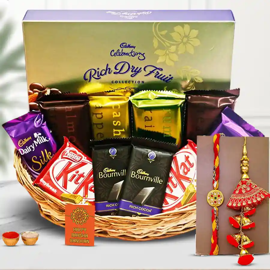 Raksha Bandhan gift basket featuring chocolates, a dry fruit tin, and a stylish Rakhi set.