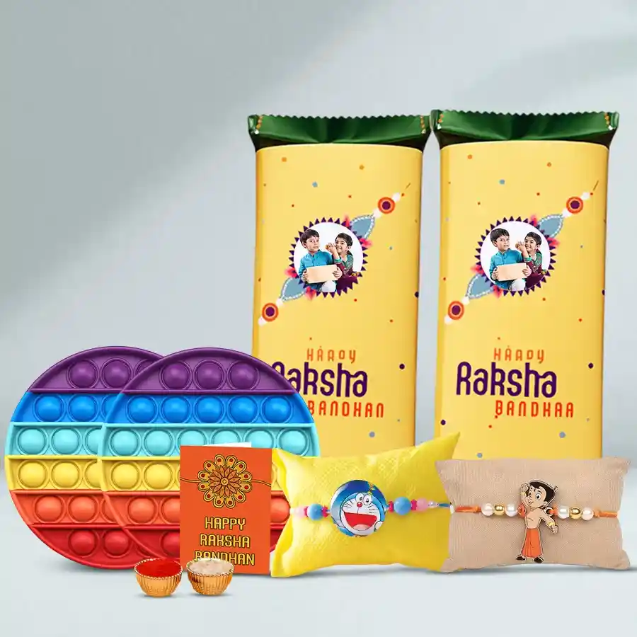 Personalized Toothsome Treat for Kids featuring custom Cadbury Temptation bars, playful kids’ Rakhis, vibrant Pop It toys, and a Rakhi set with roli, tika, and chawal.