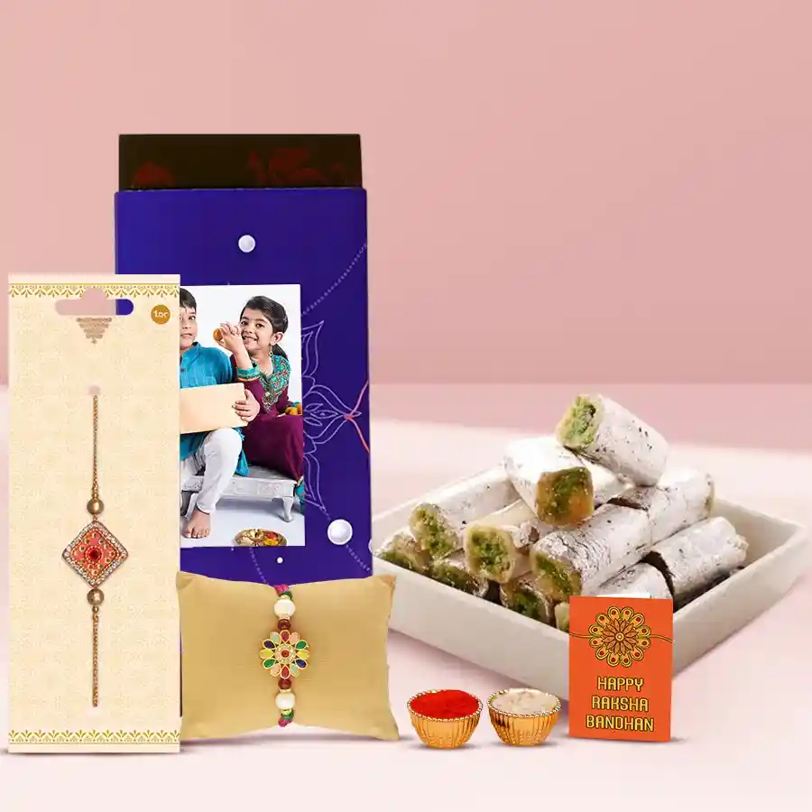 Fancy twin rakhis with personalized chocolate bar and sweets for Raksha Bandhan celebration
