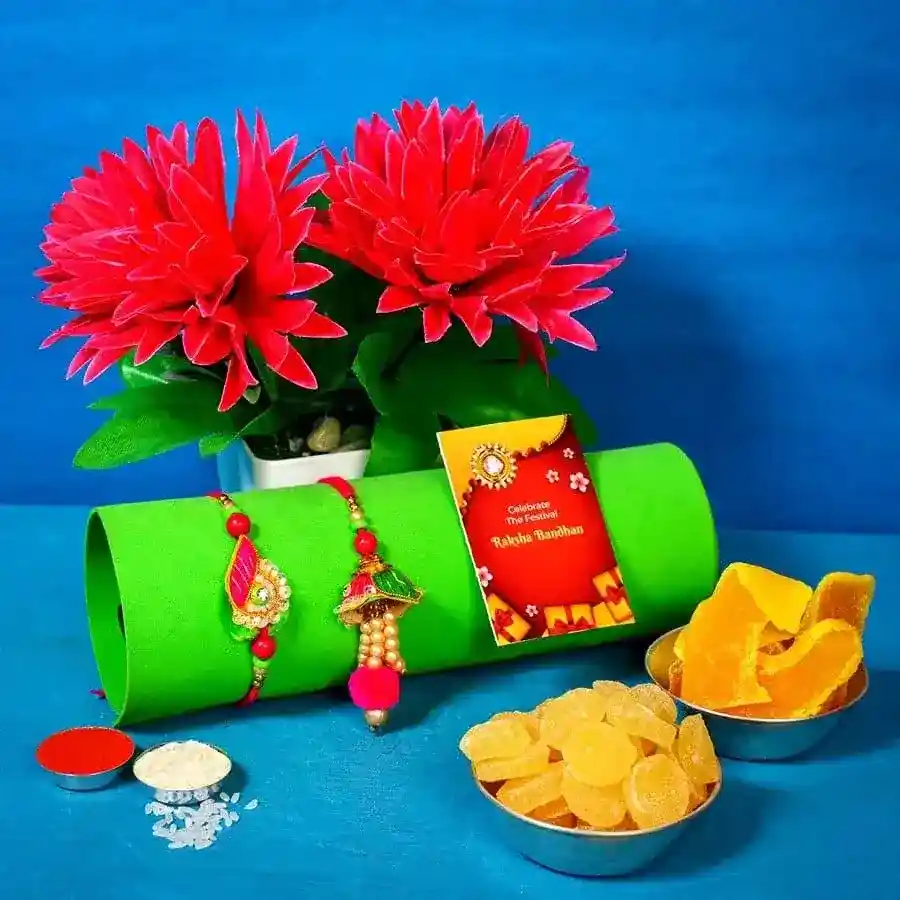 Arresting Bhaiya Bhabhi Rakhi Set with Dried Mango N Pineapple