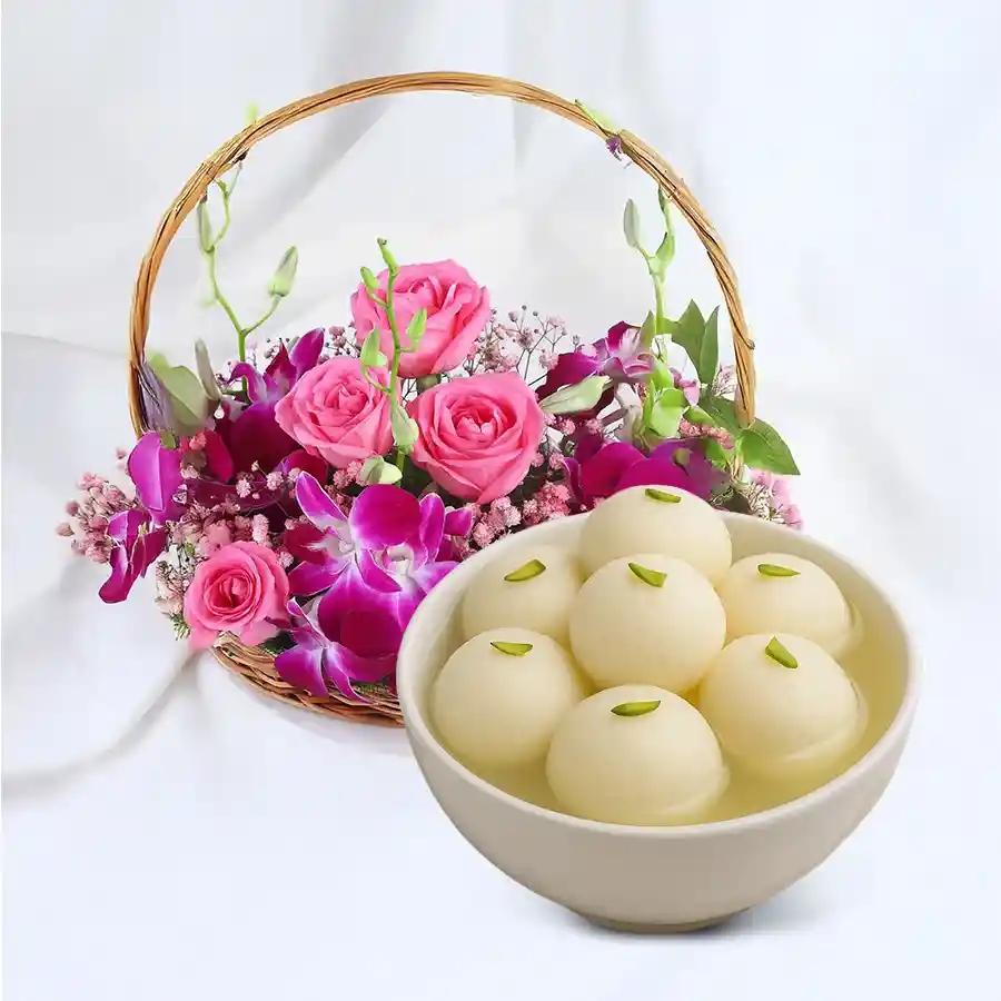 Gift combo featuring 10 Purple Orchids, 5 Pink Roses, and a can of Rosogolla.