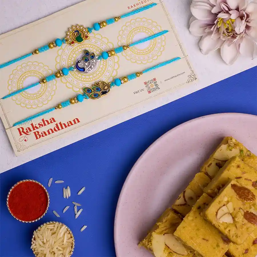 Radiant Kundan Peacock Rakhi Set N Soan Papdi Bliss