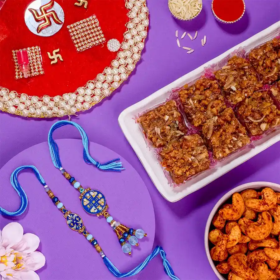 Stylish Bhaiya Bhabhi Rakhi N Delicacies Gift Set
