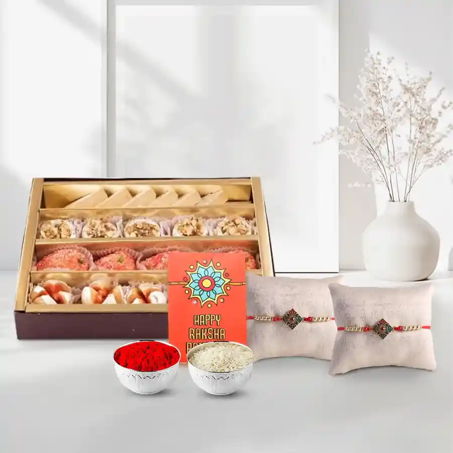 Assorted Mithai from Haldiram with 2 Free Rakhi and Lumba Roli Tilak and Chawal.