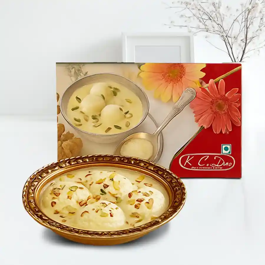 A box of 10 delectable Rosomalai pieces, tender cheese balls soaked in saffron-infused milk.