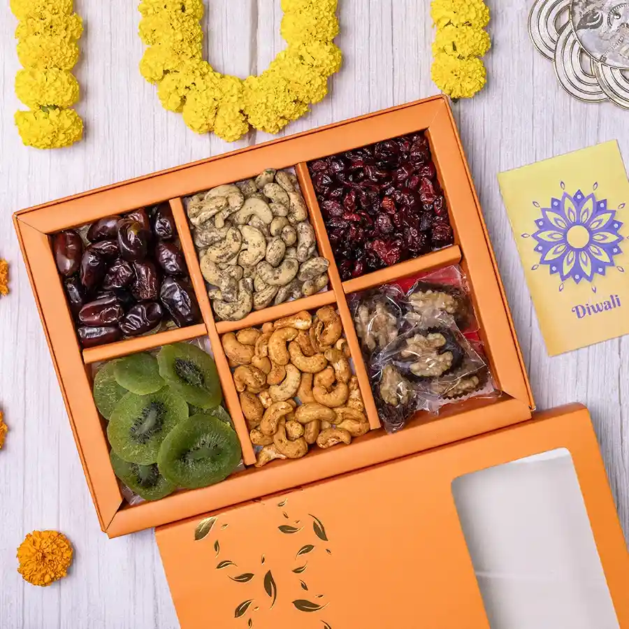 Premium Assorted Dry Fruits Collection in an elegant gift box featuring dates, walnuts, dried kiwi, cranberries, red chilli and black pepper cashews.
