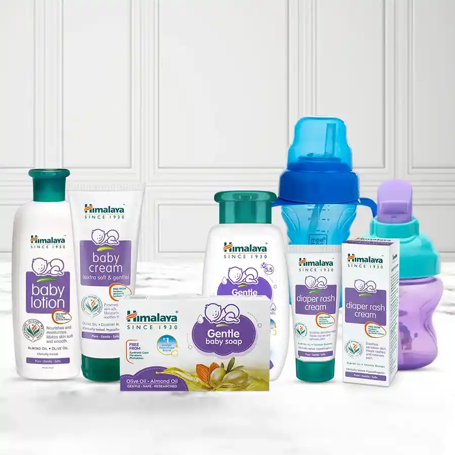 Himalaya Baby Care Gift Pack featuring lotion, creams, soap, shampoo, and a sipper cup for gentle baby care.