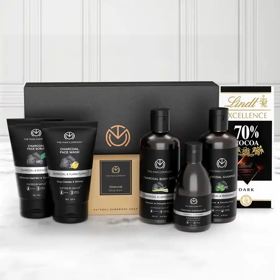 Charcoal Men's Grooming Kit with Lindt Dark Chocolate Bar and soft towel, perfect gift for a brother's birthday.