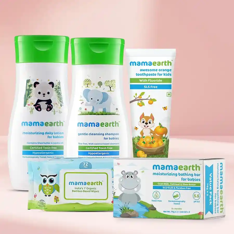 Mamaearth Baby Care Gift Set featuring lotion, wipes, toothpaste, shampoo, and soap bars for nurturing infants and toddlers.