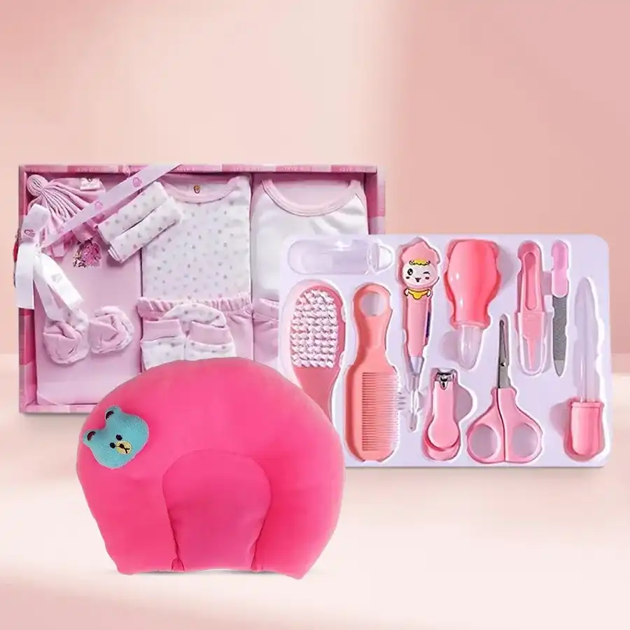Adorable Baby Gift Set including pink clothing, grooming kit, and soft neck pillow for infants aged 0-3 months.