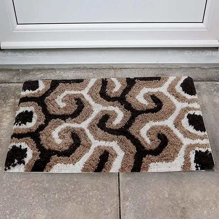 Charming brown cotton door mat, rectangular shape, hand washable, antiskid feature, 40x60 Cms size. Perfect for welcoming guests.