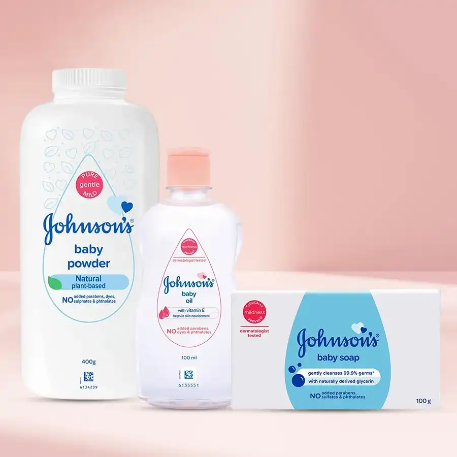 Johnson & Johnson Essential Baby Care Set including powder, oil, and soap for gentle baby care.