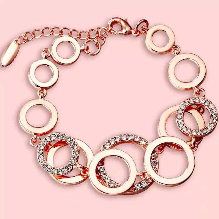 Elegant 18k rose gold bracelet adorned with sparkling crystals, perfect for gifting.