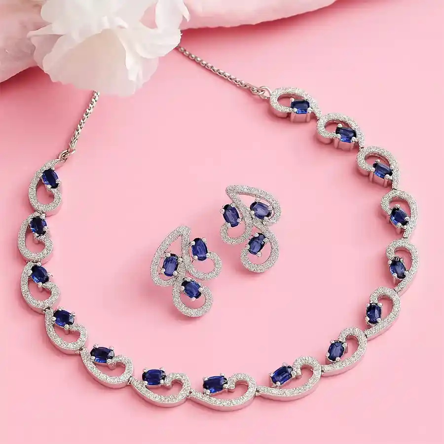 Radiant Rhodium-Plated Necklace Set with cubic zirconia and matching drop earrings.