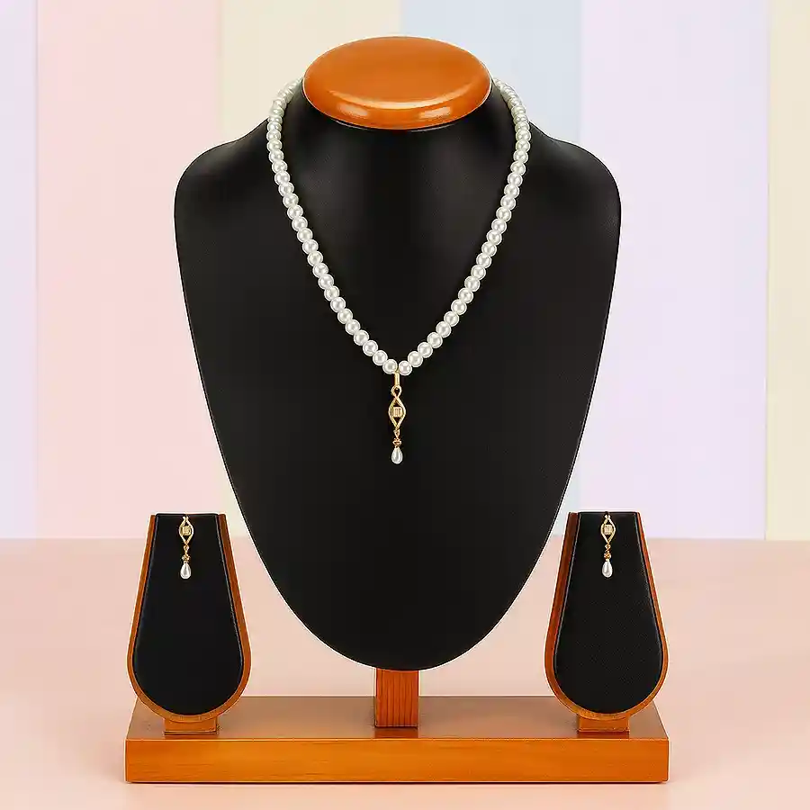 Charming Pearl Pendant and Earring Set in Barfi shape, designed to bring joy and elegance.