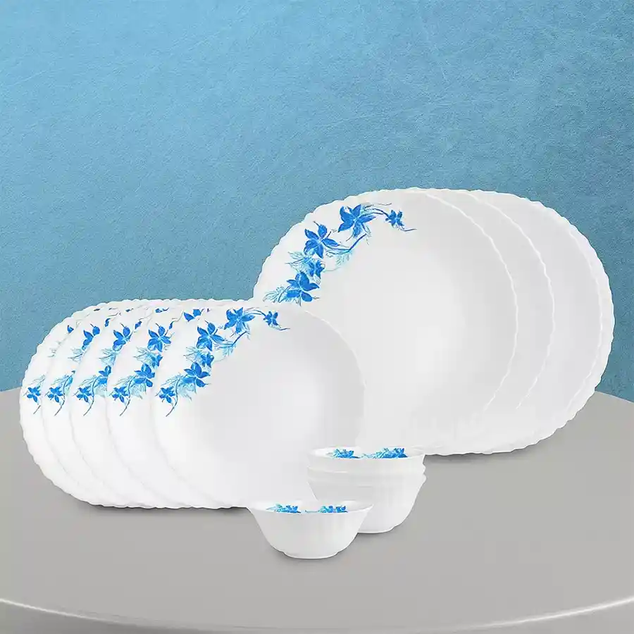 Elegant Blue Swirl Opalware Dinner Set by Cello, featuring 18 pieces including full plates, quarter plates, and veg bowls. Stylish and durable design.