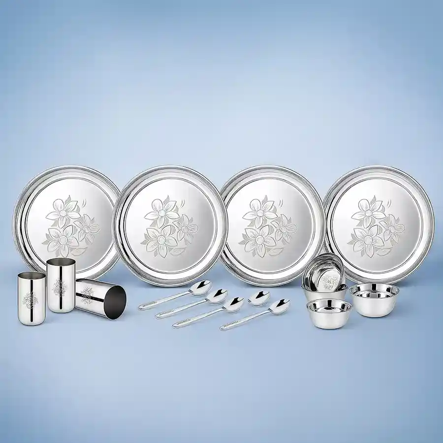 Elegant Stainless Steel Dinner Set by Classic Essentials, featuring 16 pieces including plates, glasses, spoons, and veg bowls.