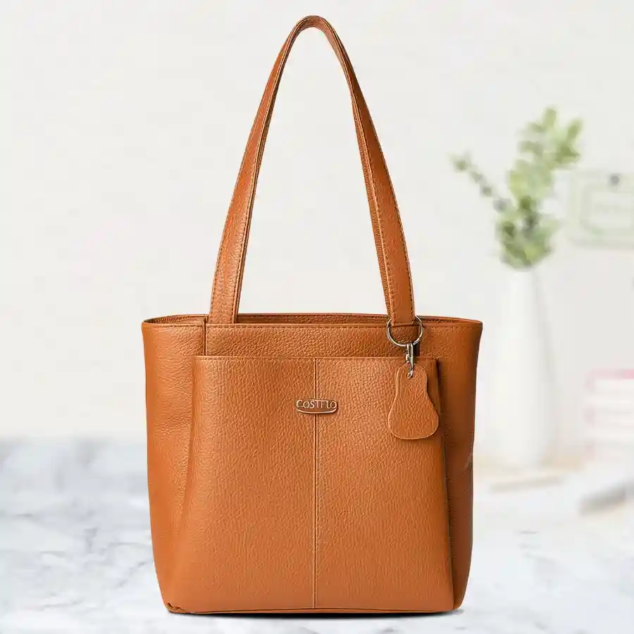 Fostelo tan faux leather satchel bag for women, featuring five pockets and two compartments. Stylish and functional handbag.