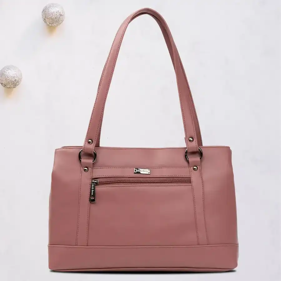 Stylish Peach Ladies Office Bag by Richborn with front zip pocket and double partitions. Perfect for work and everyday use.