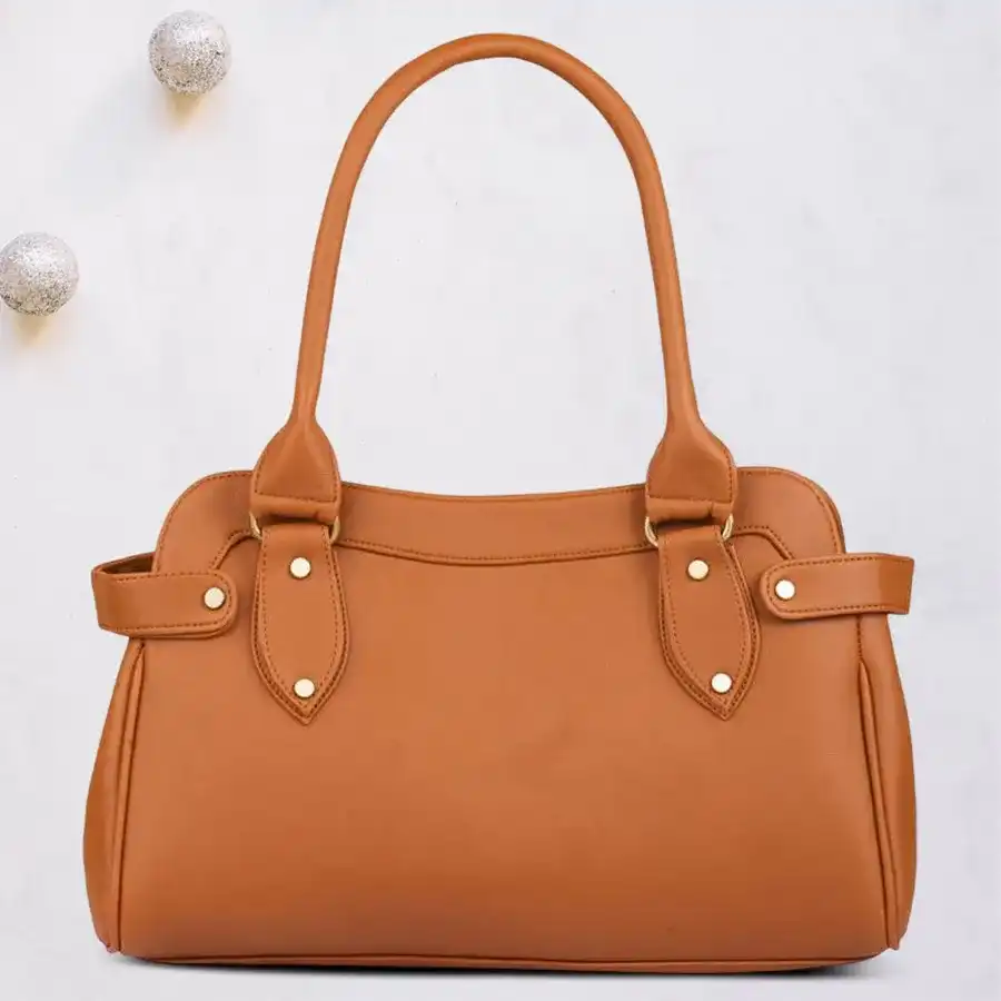 Tan faux leather shoulder bag with gorgeous embroidery pattern.