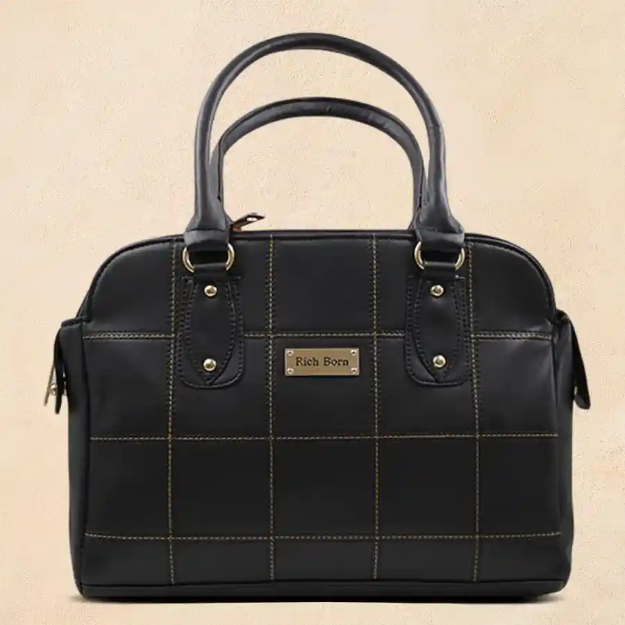 Elegant black faux leather shoulder bag with smart stitch design and detachable strap, designed for modern women.