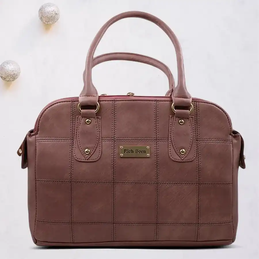 Peachy Chic Faux Leather Bag featuring a stylish design, three chambers, and a detachable shoulder strap for women.