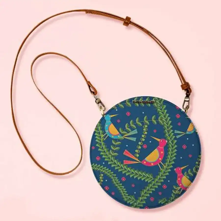 Marvellous Round Crossbody Sling Bag in teal birds multi-color design.