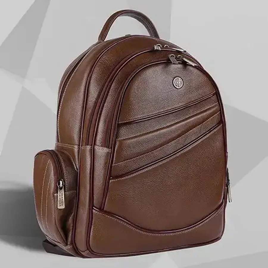 Stylish leather laptop backpack in Brushwood color, designed for laptops up to 16 inches.