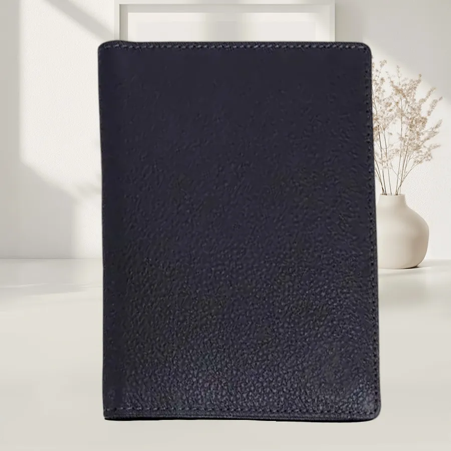 Grey leather travel passport holder with RFID protection, featuring organized slots for passport, cards, and ID.